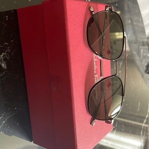 Salvador Ferragamo sun glasses.